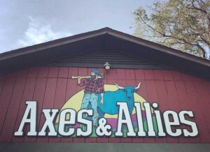 Front entrance of Axes and Allies axe-throwing venue in downtown Wilmington