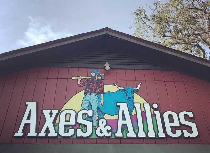 Front entrance of Axes and Allies axe-throwing venue in downtown Wilmington