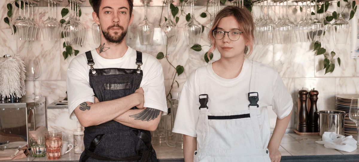 Two people working together in a small business, highlighting teamwork, local entrepreneurship, and independent business ownership in Wilmington, NC.
