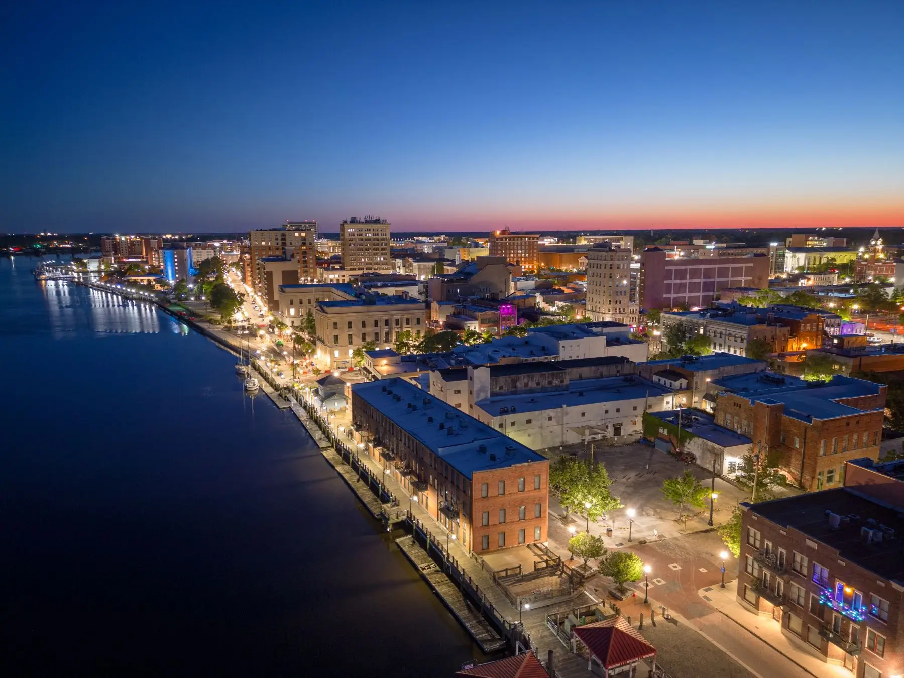 Night time view of booming businesses in Wilmington